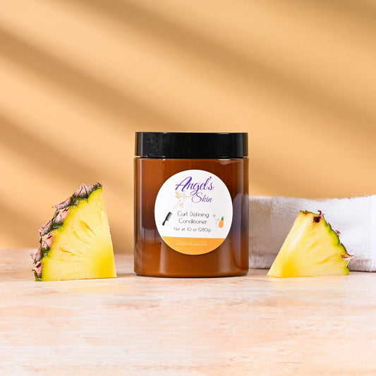 Curly Hair Conditioner jar with pineapple slices on wooden surface and beige background